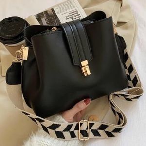 Ivy & Taylor black adjustable cross body bag